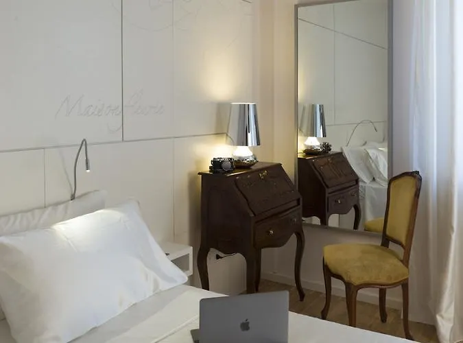 Couette-café Maison Fleurie 4*